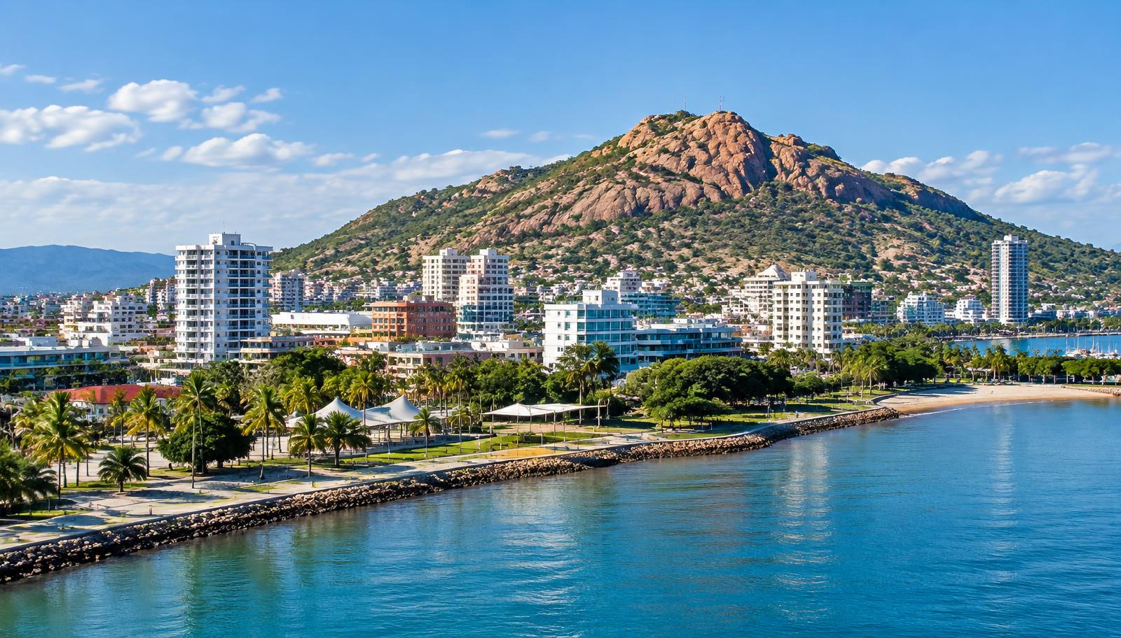 Townsville waterfront beneath Castle Hill — illustrative city image